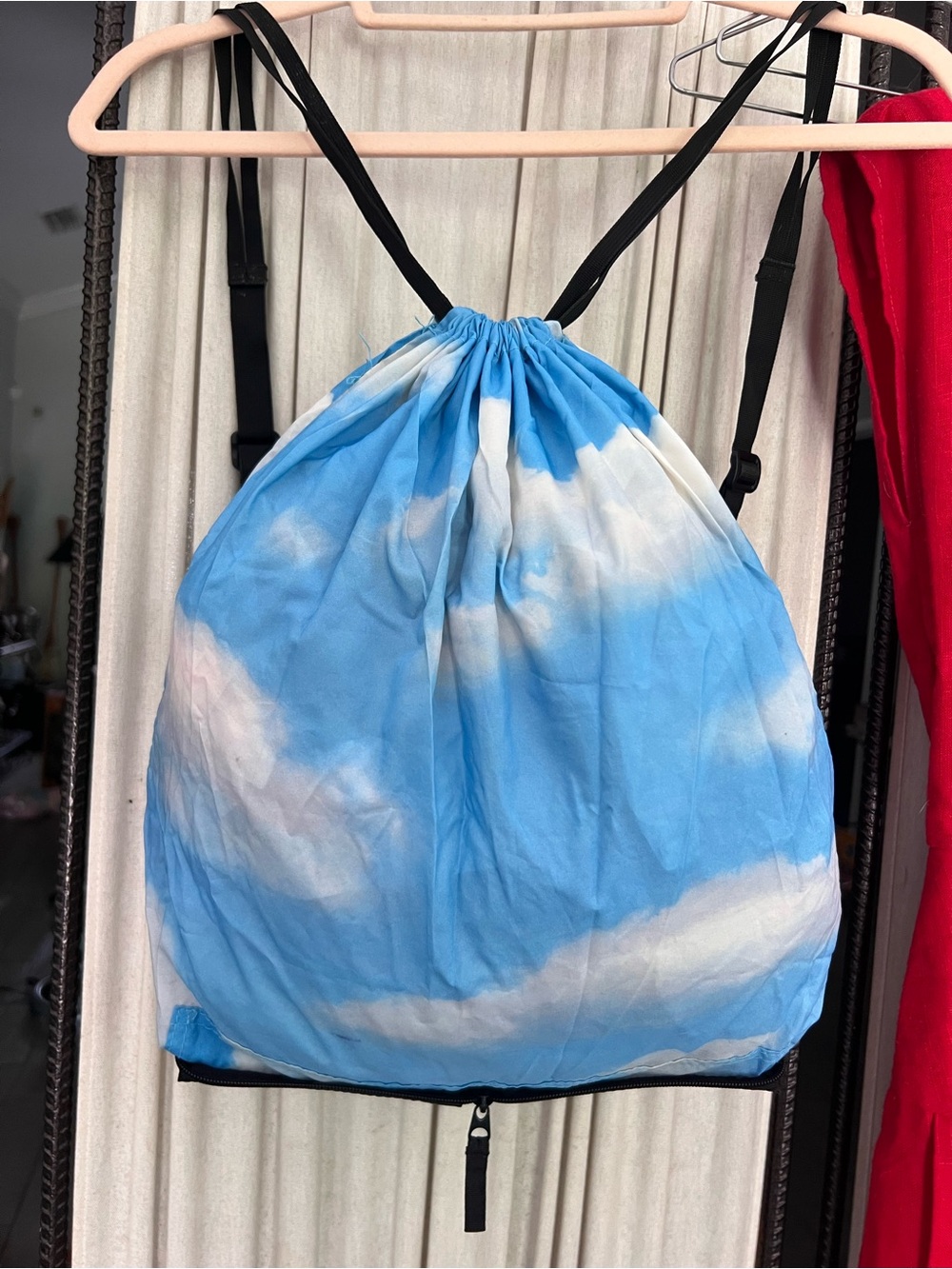 Moma Sky Blue and White Tie-Dye Drawstring Backpack read below